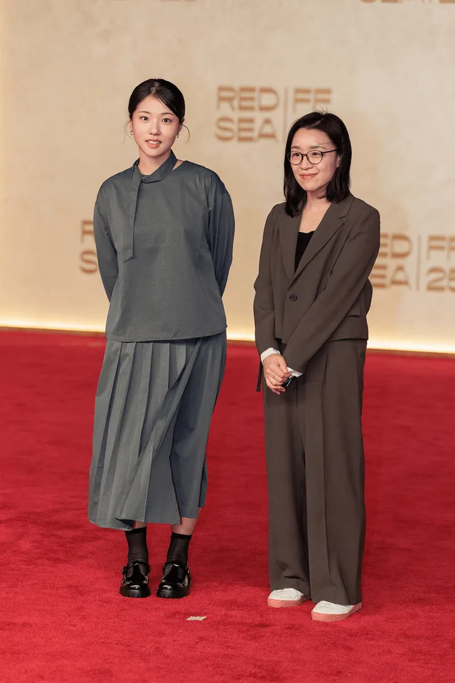 Seo Su-bin and Yoon Ga-eun attend a screening of The World of Love at the Red Sea International Film Festival in Jeddah, Saudi Arabia, on December 6, 2025.
