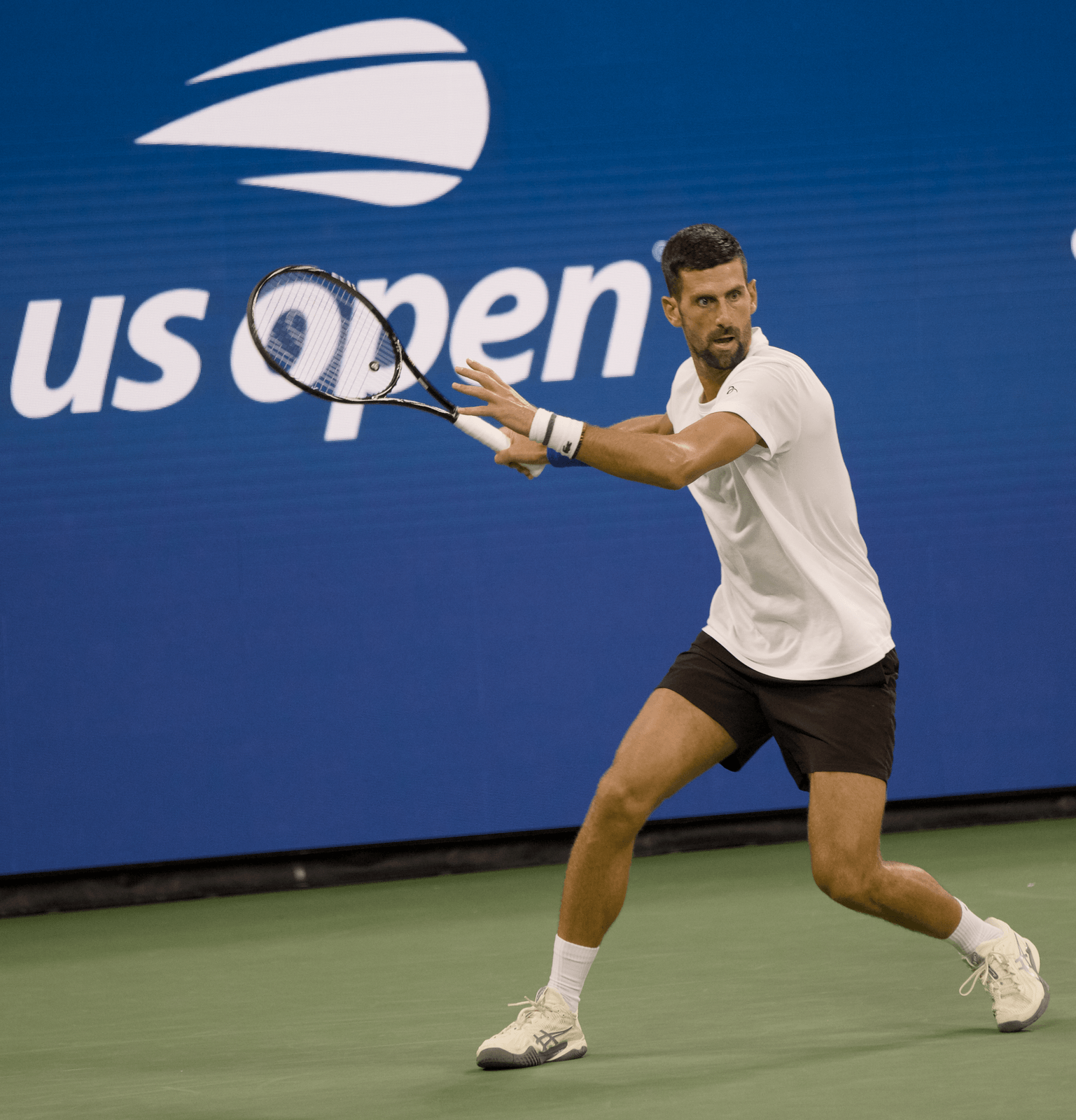Publicly licensed image of Novak Djokovic playing at Arthur Ashe Stadium during the 2026 US Open